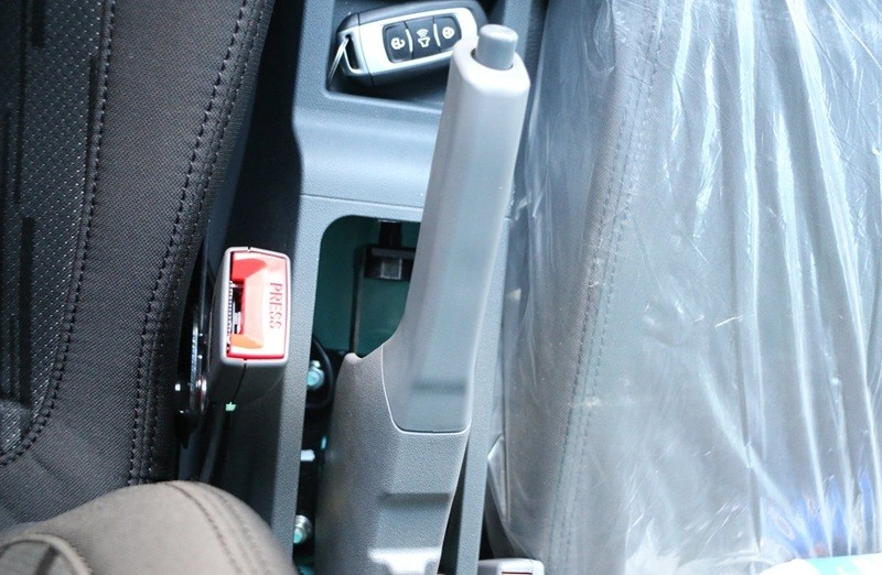 Parking brake and cab controls of the Qingling EVM100
